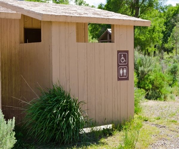 Outdoor Bathroom Facility at Campground by Adventure_Photo 